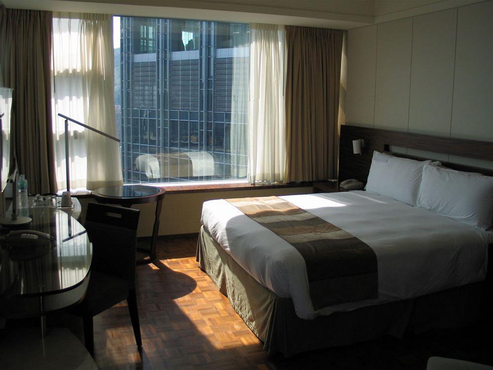 Nina Hotel Tsuen Wan West Hong Kong Exterior photo A room at the hotel