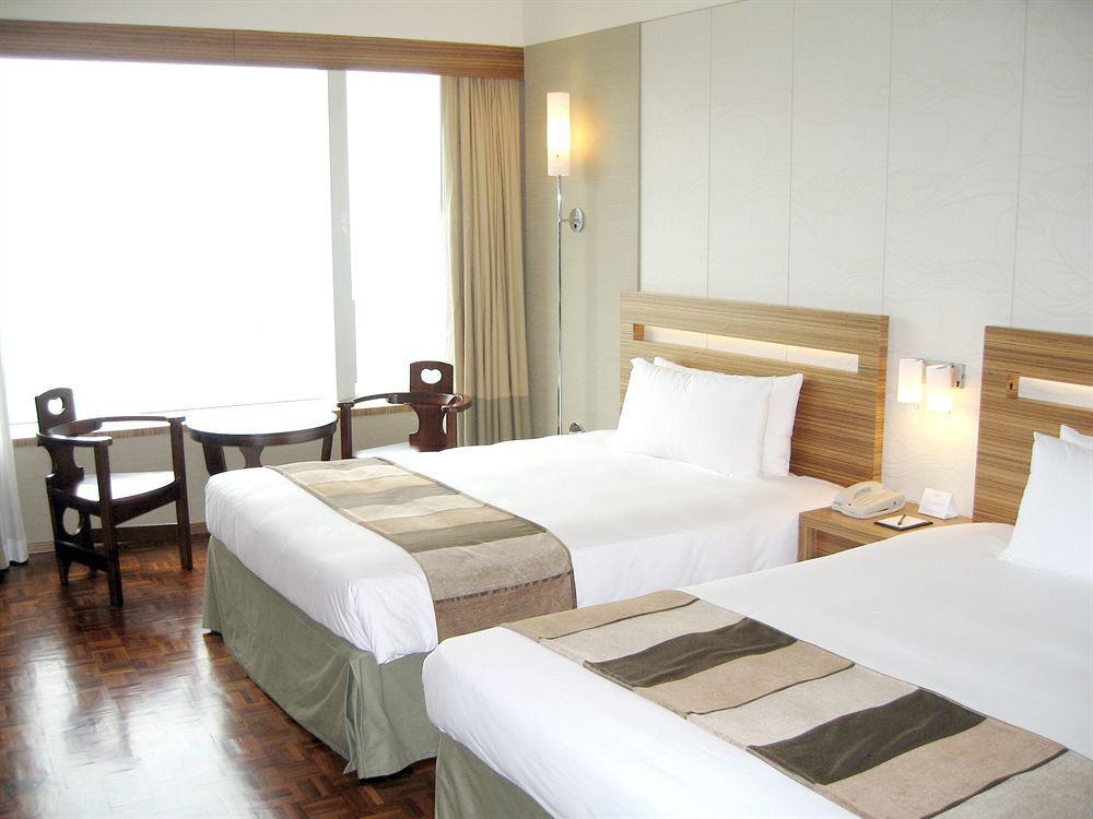 Nina Hotel Tsuen Wan West Hong Kong Exterior photo A room at the hotel